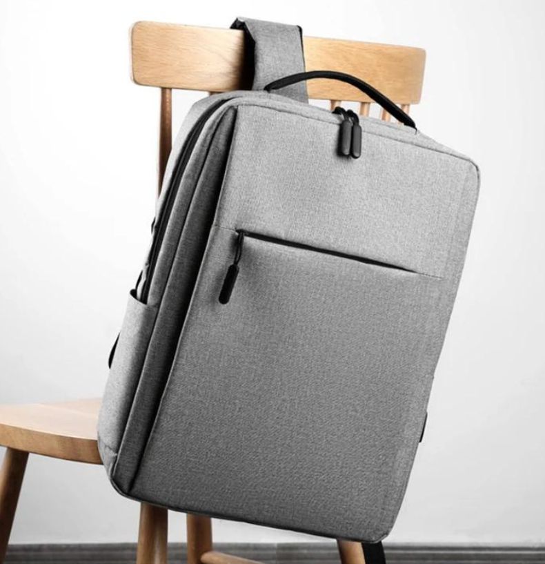 sac homme business gris accroché