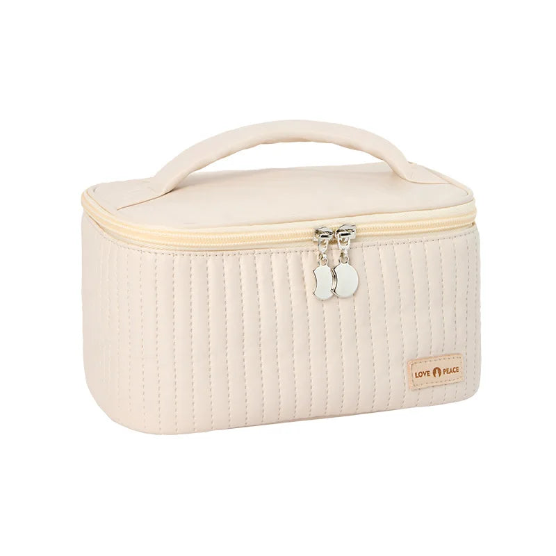 grande trousse de toilette matelassée coloris beige