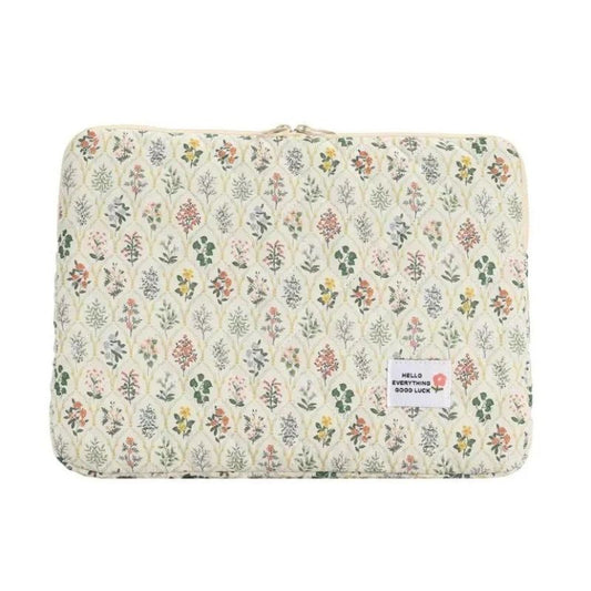 pochette d'ordinateur fleurie et matelassée blanche vue de face
