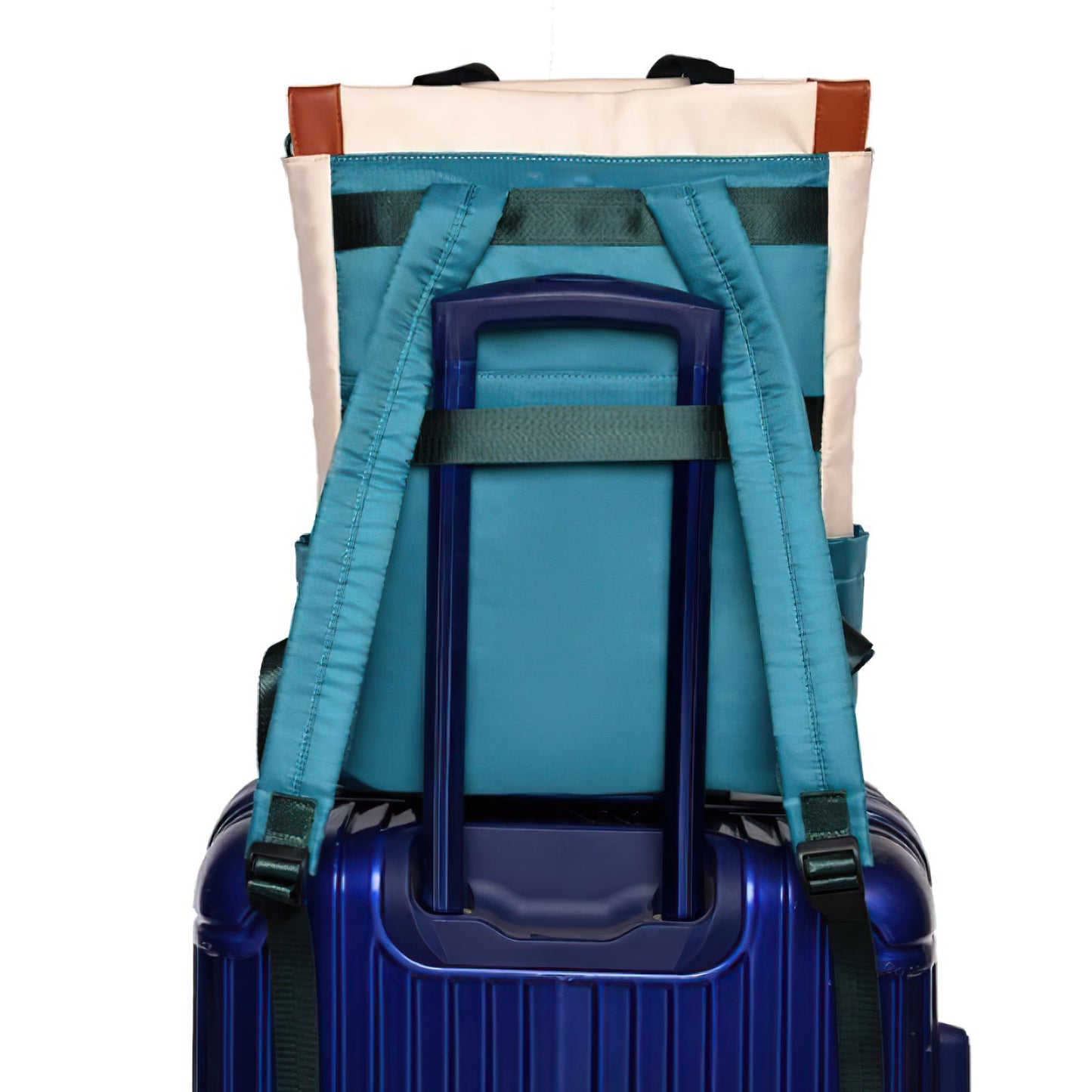 sac à dos femme de ville accrochée à une valise