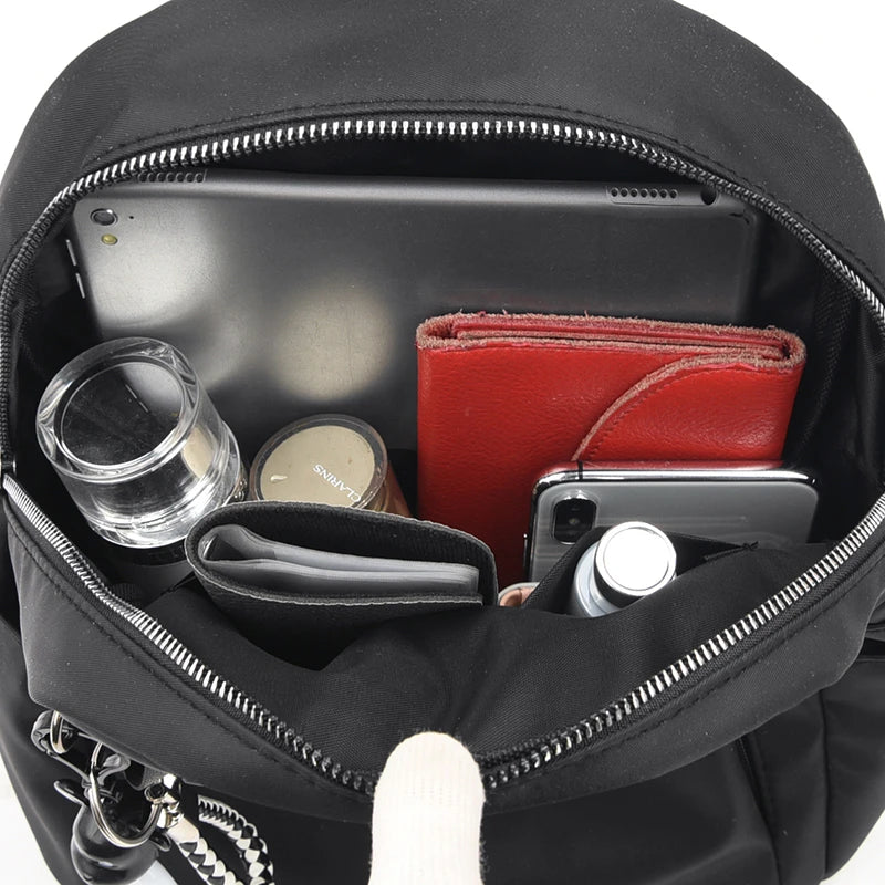 sac à dos anti pickpocket pour femme noir vue de l'intérieur rempli