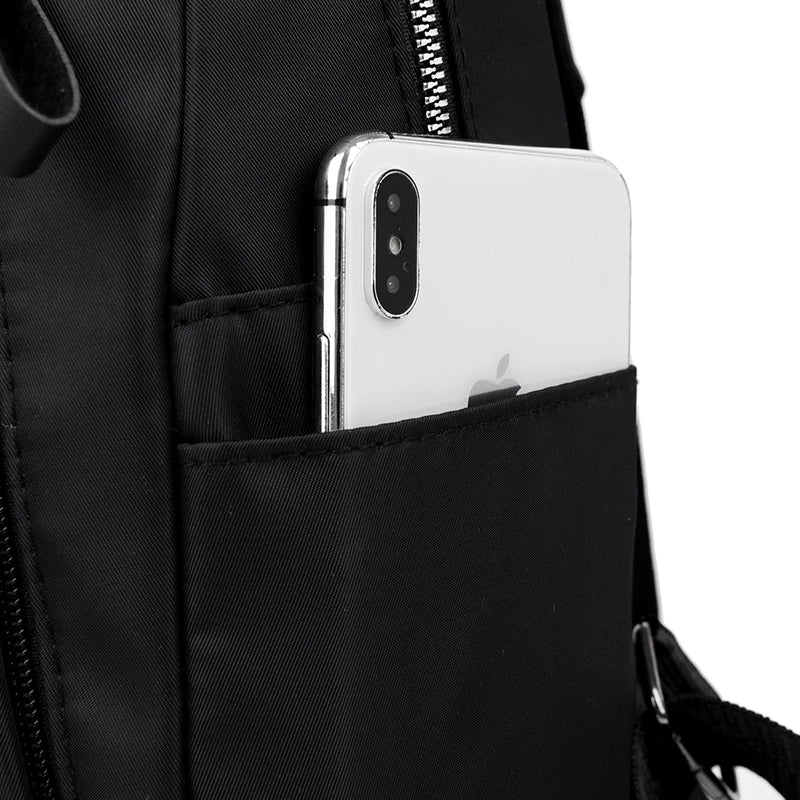 sac à dos anti pickpocket pour femme noir avec poche latérale