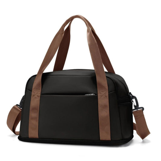 sac de voyage cabine pour femme noir avec bretelles marrons vue de face