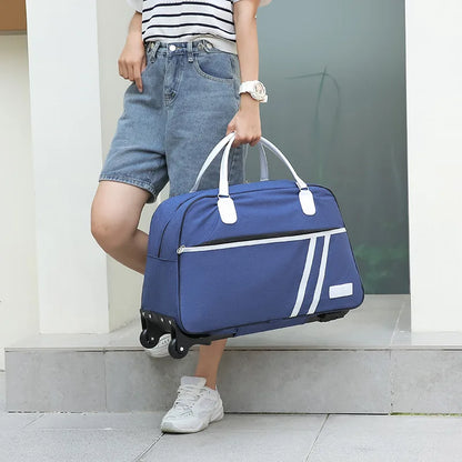 sac de voyage étanche à roulettes bleu valise porté avec une anse