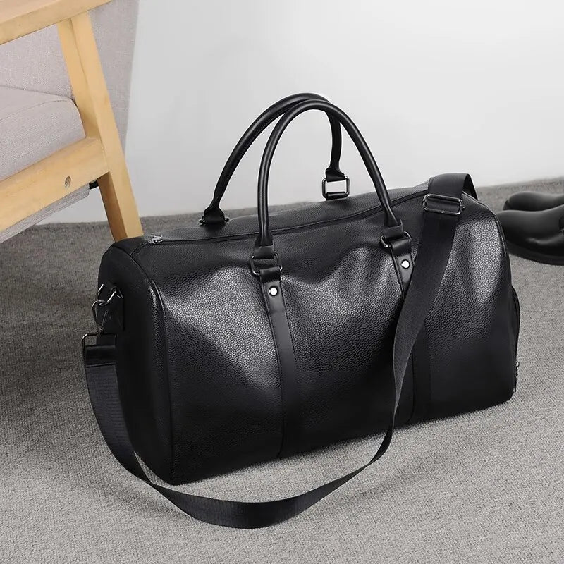 sac de voyage vintage pour femme noir posé sur le sol