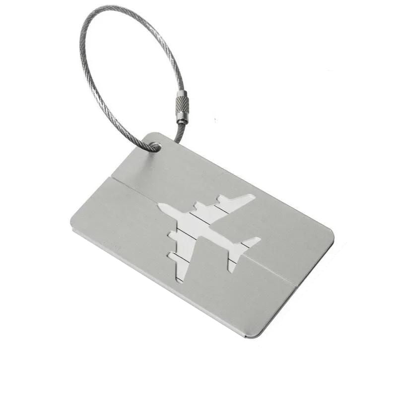 étiquette bagage aéroport coloris gris