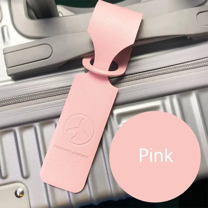 étiquette valise aéroport rose