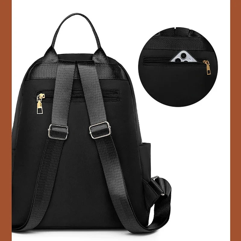 petit sac anti pickpocket pour femme vue de derrière coloris noir 