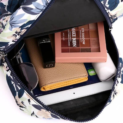 sac à dos en tissus femme vue d'intérieur remplie