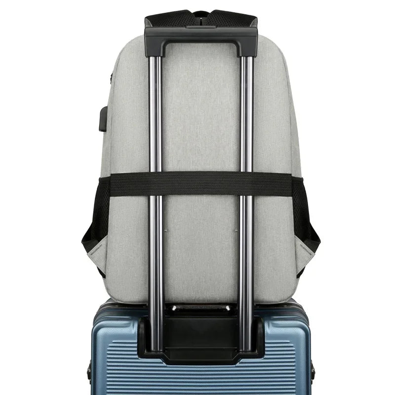 sac à dos ordinateur avec compartiment isotherme gris attaché à une valise