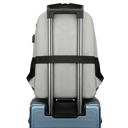 sac à dos ordinateur avec compartiment isotherme gris attaché à une valise
