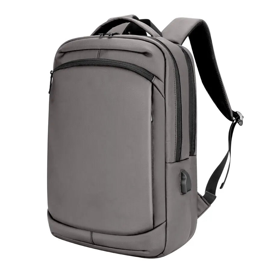 sac à dos pour ordinateur en voyage d'affaires couleur gris vue de profil