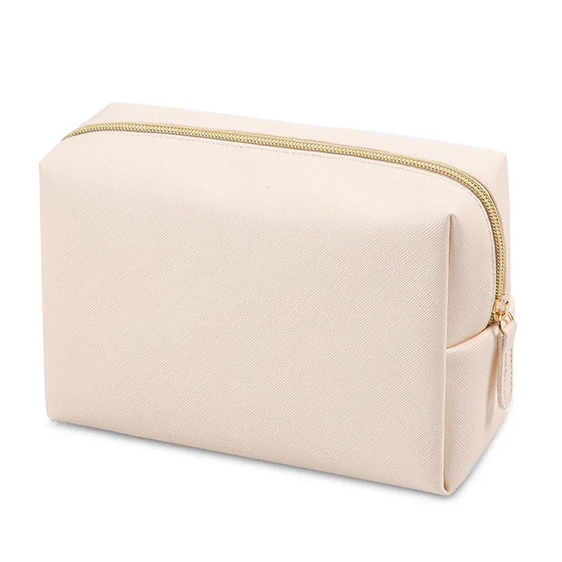 trousse de toilette xxl pour femme beige vue de profil 